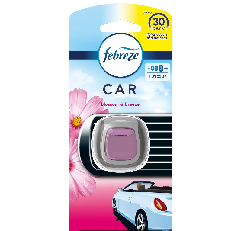 Febreze Car Clip Blossom & Breeze attached to car air vent Febreze Car Clip Blossom & Breeze attached to car air vent